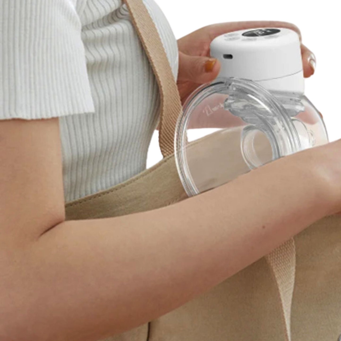 Tire lait avec mesure de téterelle adaptée au mamelon