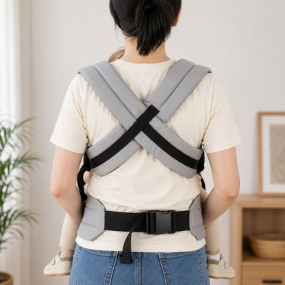Porte bébé ventral et dorsal gris, vue arrière des bretelles croisées et de la ceinture