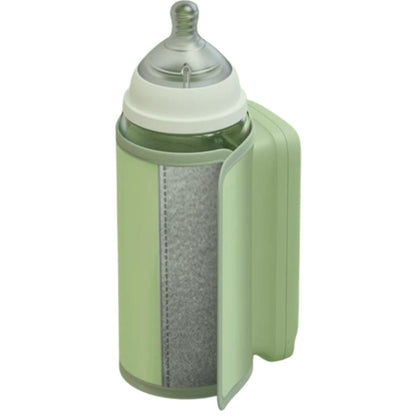 Chauffe biberon nomade avec biberon ouvert en coupe