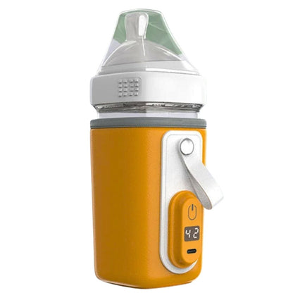 Chauffe biberon nomade orange moutarde avec tétine intégrée et écran affichant 42°C