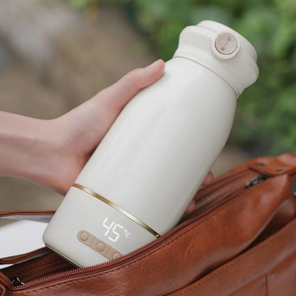 Chauffe biberon nomade rangé dans un sac de voyage