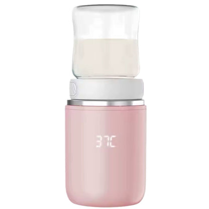 chauffe biberon usb rose avec biberon fixé sur l’adaptateur, en chauffe