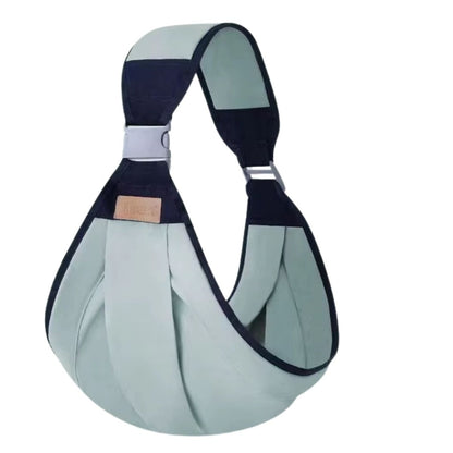 Echarpe de portage étalée sur une surface plane, montrant sa texture douce et souple