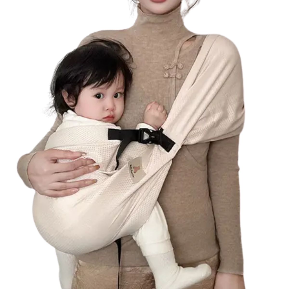 Écharpe de portage beige avec bébé éveillé installé contre le parent