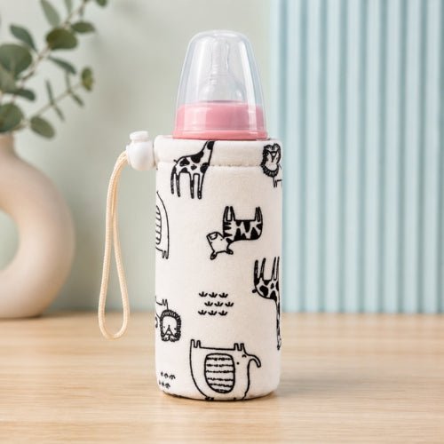 Housse pour biberon à motifs animaux noir et blanc en taille 300 ml avec cordon intégré