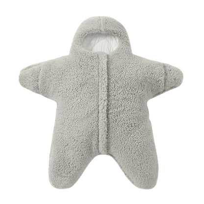 Nid d’ange bébé vide, posé en vue de face avec capuche visible et forme matelassée