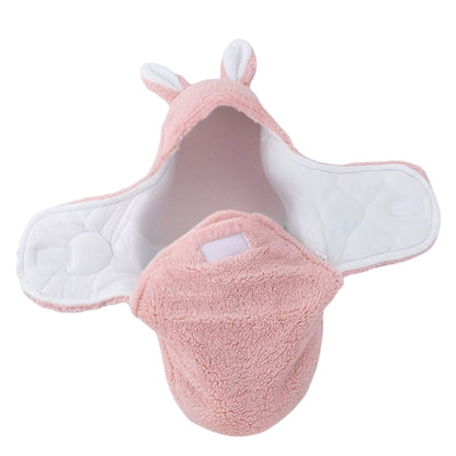 Nid d’ange rose vide en vue de face, capuche ouverte et intérieur matelassé visible