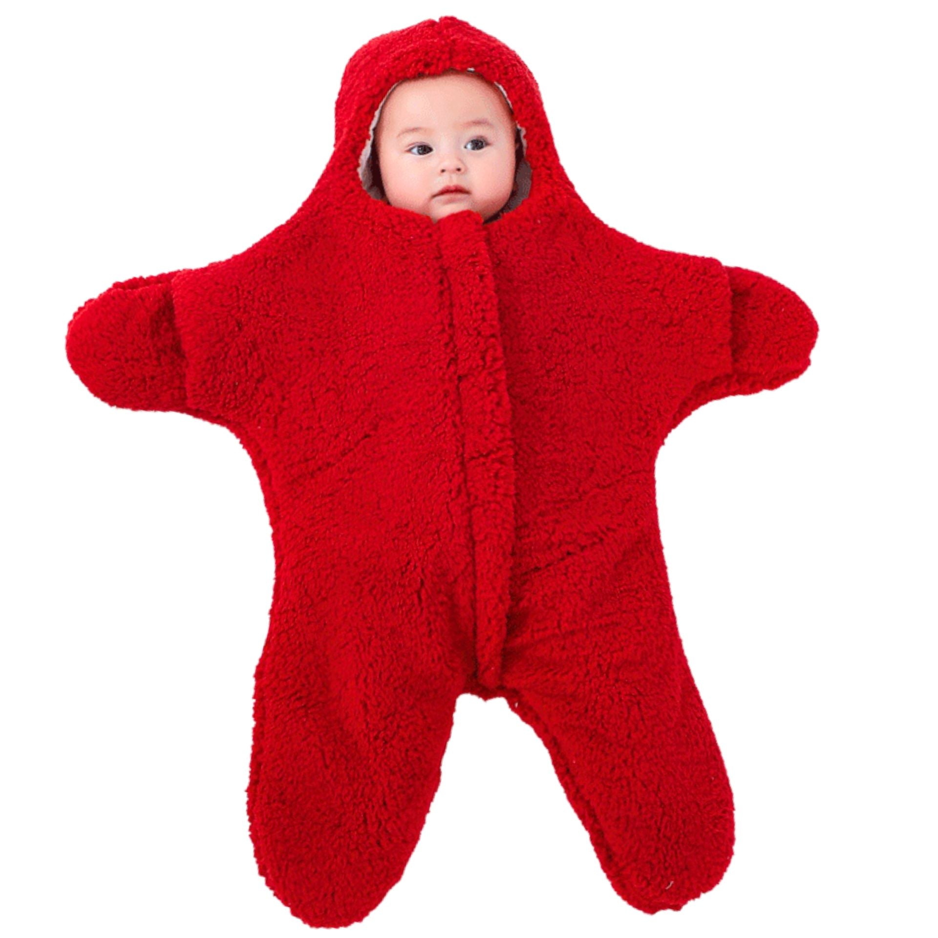 Nid d’ange rouge avec bébé endormi seul, installé confortablement dans un cocon douillet

