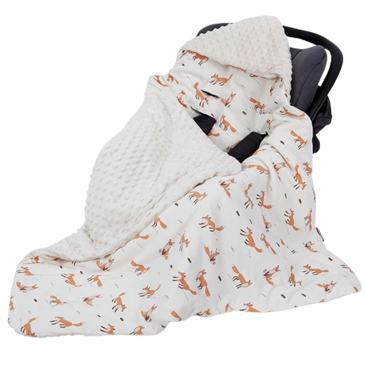 Nid d’ange leger renard blanc pliable posé sur cosy de transport