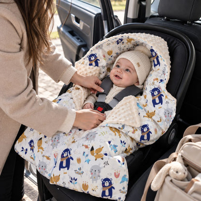 Nid d'ange siège auto motif ours blanc avec système de retenue accessible et pans rabattables