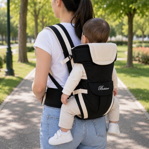 Porte bebe 4 en 1 beige utilisé en position dorsale avec bébé