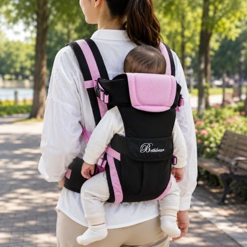Porte bebe 4 en 1 rose utilisé en position dorsale avec bébé