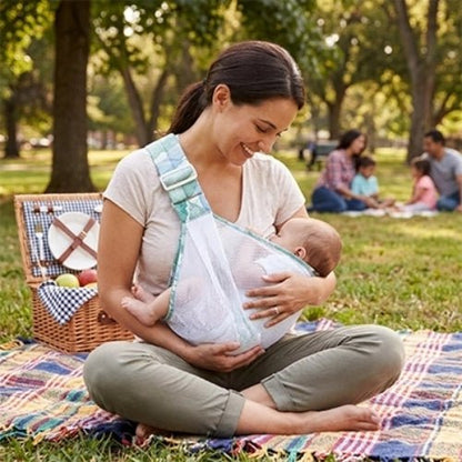 Porte-bébé à une épaule en maille blanche vert d’eau avec assise large et sangle réglable, au pique-nique