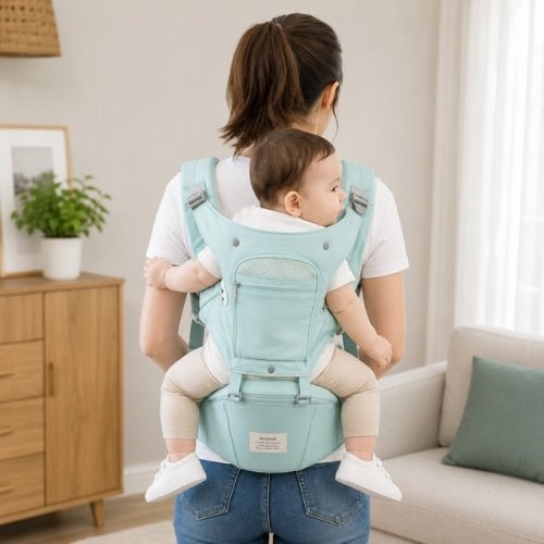 Porte-bébé avec capuche vert d’eau, panneau ouvrable et rangements, utilisé en portage dorsal