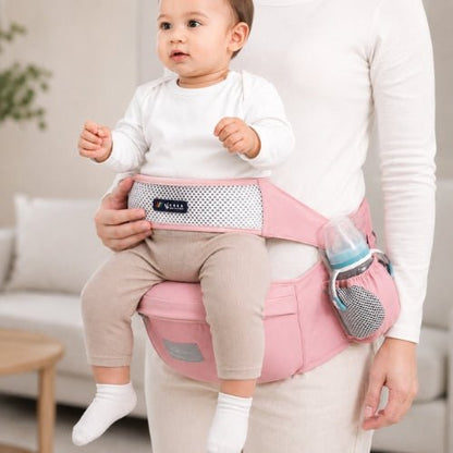 Porte bebe cote hanche rose avec siège large et porte-biberon latéral