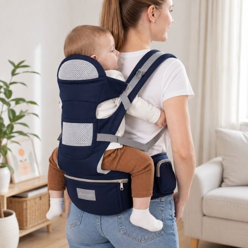 Porte bebe evolutif bleu marine porté en position dorsale avec bébé