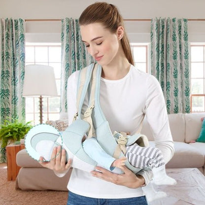 Porte bebe evolutif vert eau présenté en position horizontale avec bébé