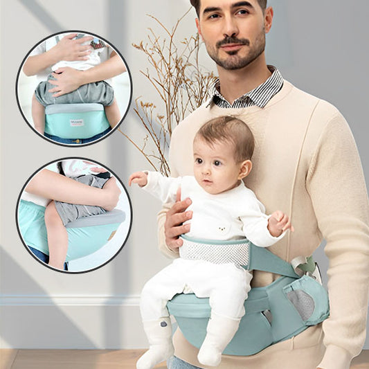 Porte bébé naissance vert clair FirstHug, offrant une mobilité optimale grâce à une ceinture robuste et un design léger et ergonomique