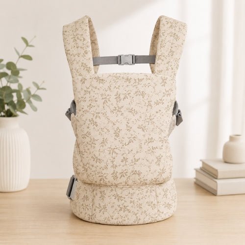 Porte bebe preforme beige fleuri présenté seul avec sangle dorsale réglable