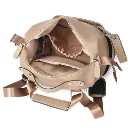 Sac à dos à langer avec grande ouverture zippée et poches intérieures élastiques