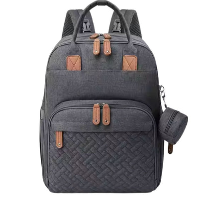 Sac à dos à langer Gris foncé vu de face, design compact avec fermeture éclair apparente 