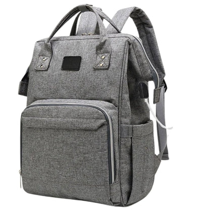 Sac à langer à dos avec ouverture large, port USB et compartiments latéraux