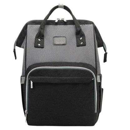 Sac à langer à dos avec poignée rigide et grande poche avant zippée