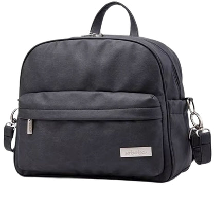 sac a langer noir présenté seul sur fond blanc