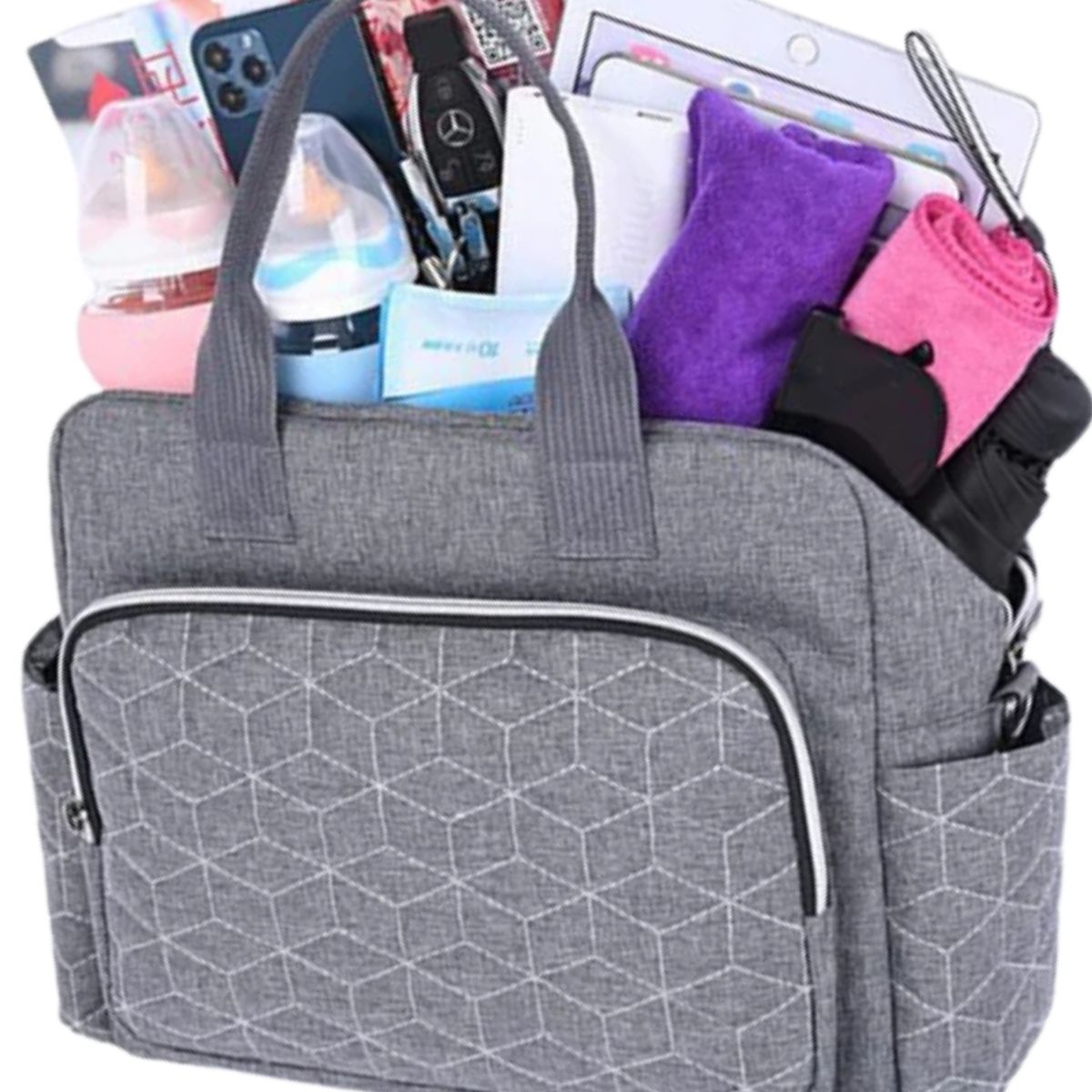 Sac a langer gris ouvert montrant le rangement intérieur et accessoires