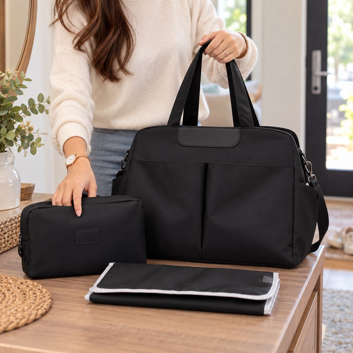 Sac à langer avec tapis de change noir avec trousse assortie et tapis pliable