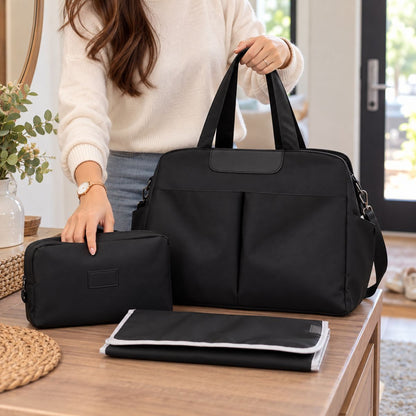 Sac à langer avec tapis de change noir avec trousse assortie et tapis pliable