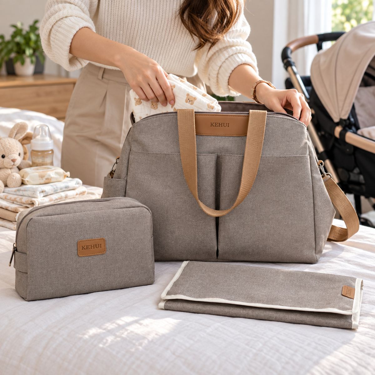 Sac à langer avec tapis de change taupe avec trousse assortie et tapis pliable