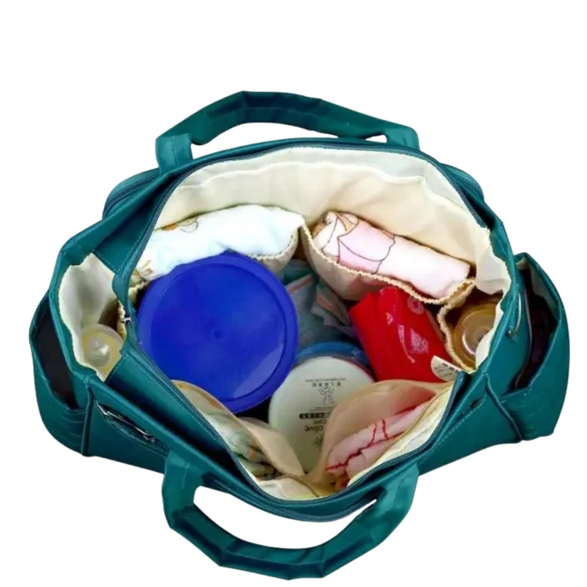 Sac a langer avec tapis de change vert paon, vue intérieure avec compartiments remplis d’accessoires bébé