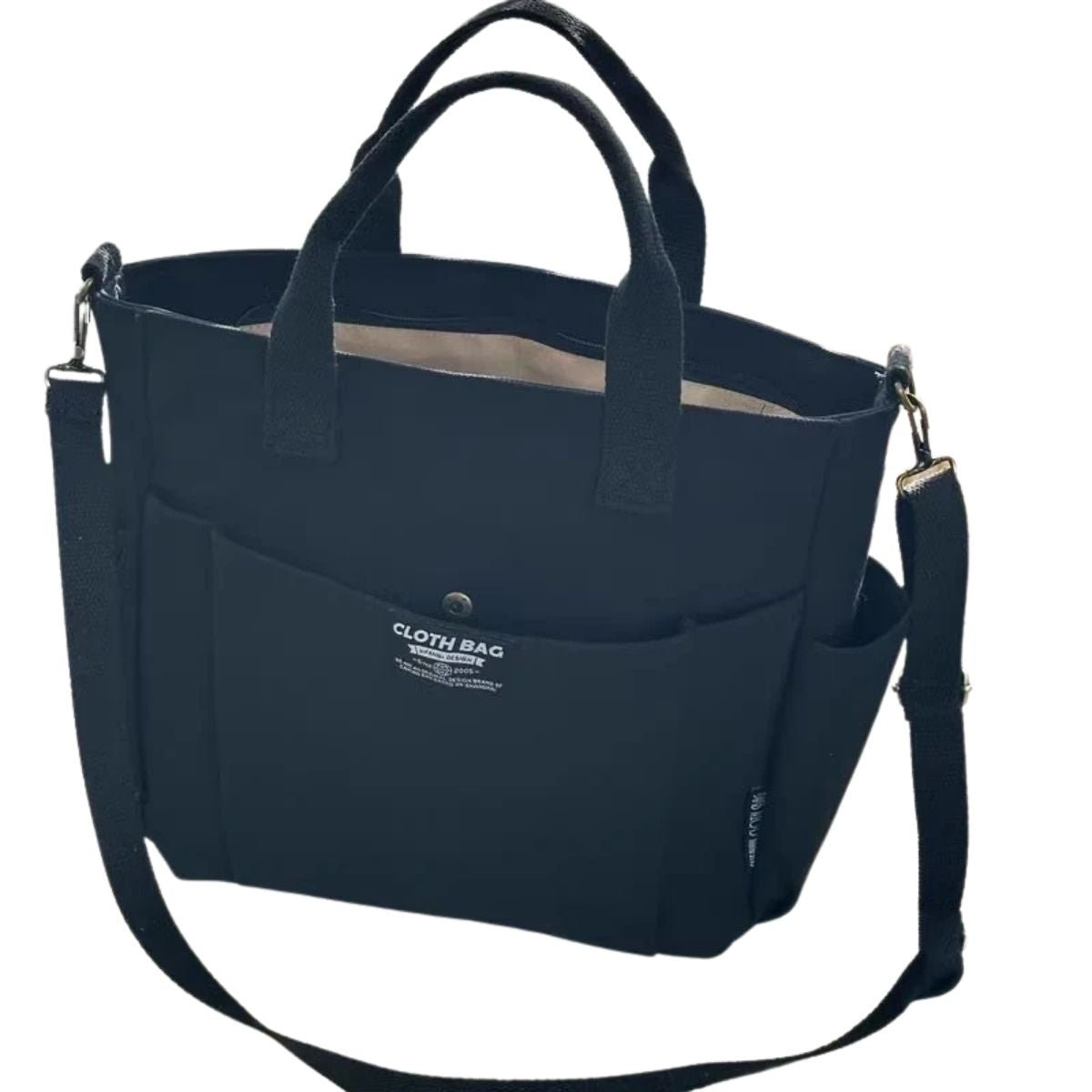 sac a langer femme compact noir en toile rigide avec bandoulière