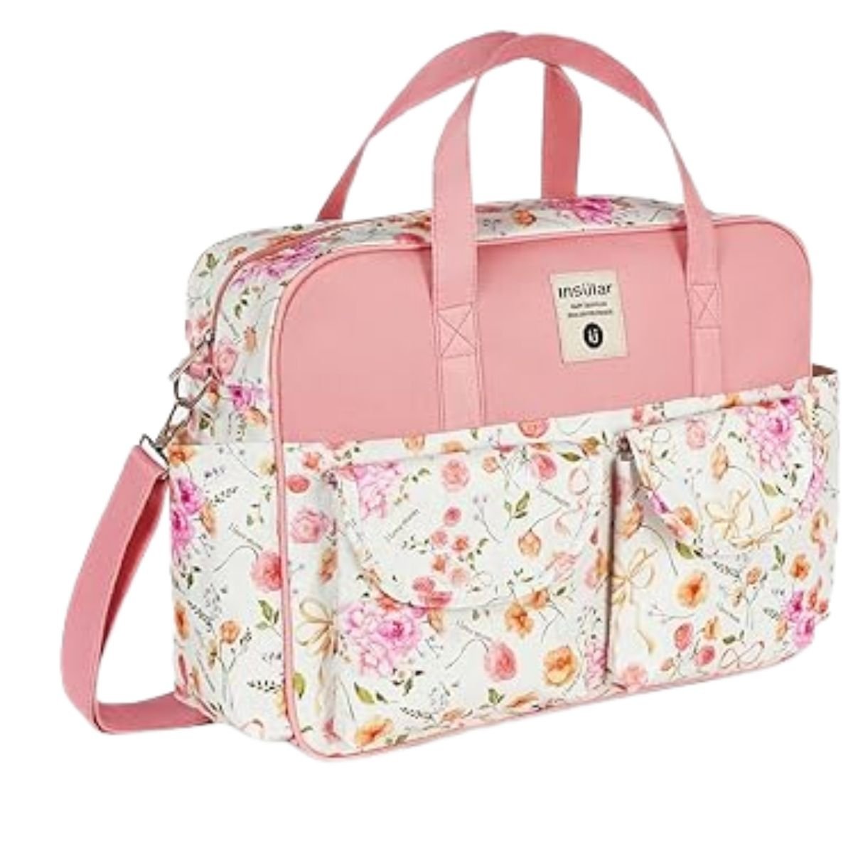 Sac a langer grande capacite fleurs roses avec poches extérieures et bandoulière réglable.