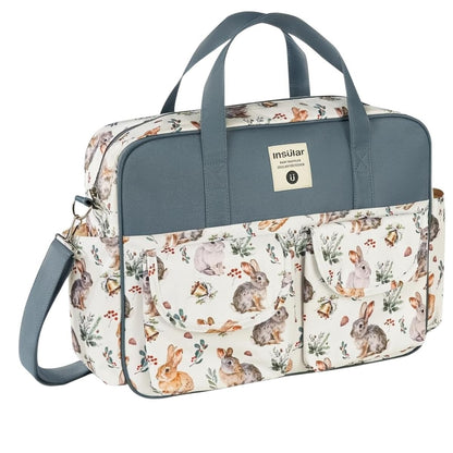 Sac a langer grande capacite lapin de Noël bleu-gris avec poches frontales et bandoulière réglable.