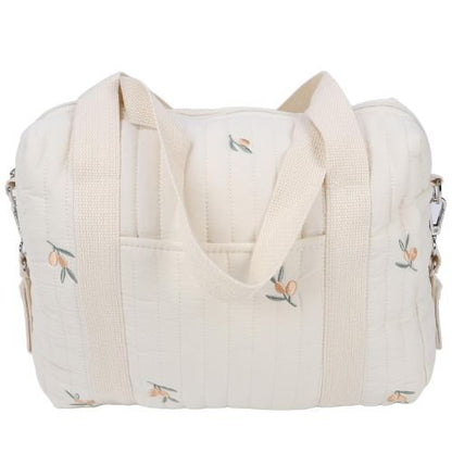 sac a langer matelassé crème à feuillage d’olivier brodé, posé de dos sur fond blanc