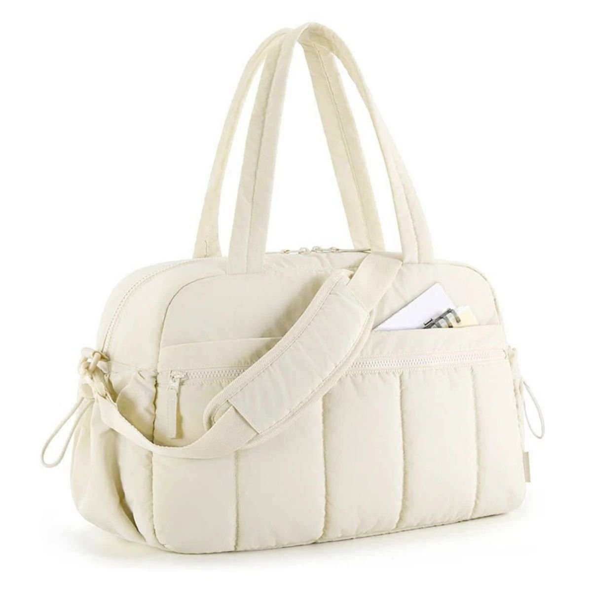 Sac a langer multifonction couleur beige en vue latérale