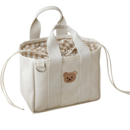 Sac a langer à motif ourson, avec cordon de serrage intérieur et anses renforcées