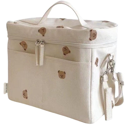 Sac a langer posé de face avec coutures visibles et fermeture simple
