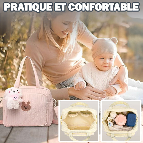 Sac a langer rose conçu pour faciliter chaque sortie avec bébé grâce à une organisation pratique