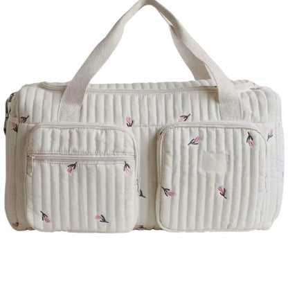  sac a langer creme avec motif tulipe brodee et deux grandes poches zippees