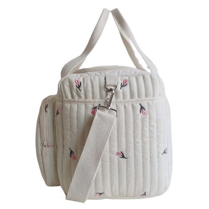  sac a langer tulipe brodee vu de cote avec poches verticales