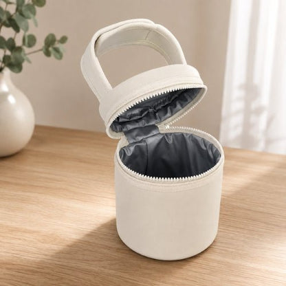 Sac cylindrique pour biberons beige ouvert avec doublure PEVA et poignée auto-agrippante