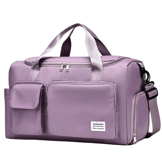 Sac maternité violet clair avec poches multiples, vue de face