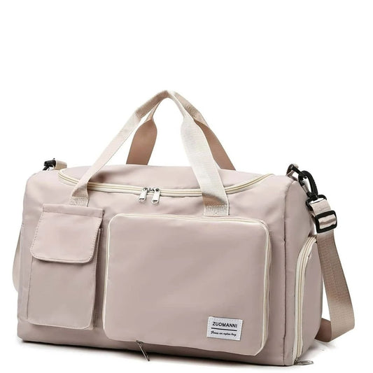 Sac maternité beige avec poches avant et bandoulière réglable