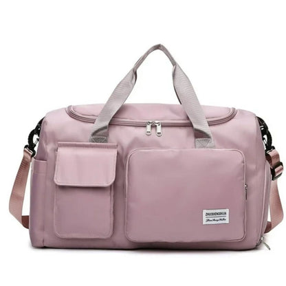 Sac maternité rose foncé avec grandes poches avant et anses renforcées