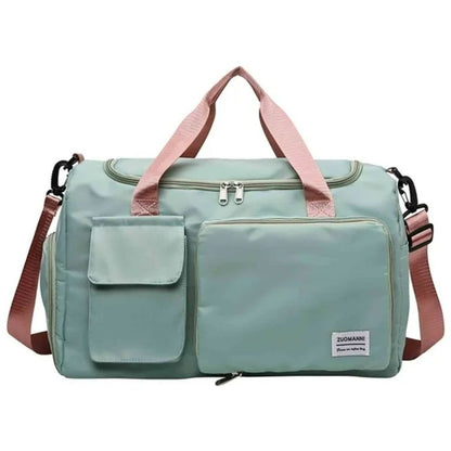 Sac maternité rose vert avec poches avant et anses contrastées
