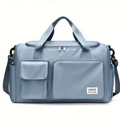 Sac maternité bleu ciel avec grandes poches avant et bandoulière