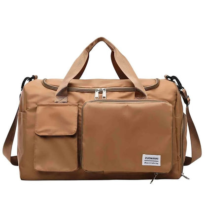 Sac maternité kaki avec poches avant et bandoulière ajustable